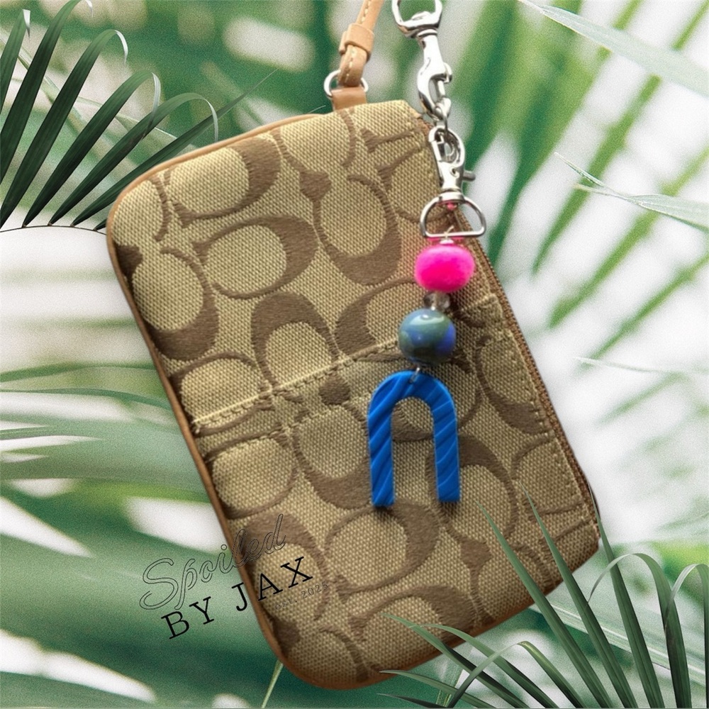 Coach Signature Canvas Wristlet with Beaded Charm